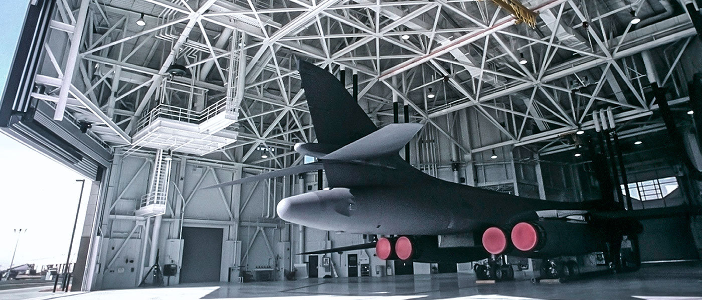 Military hangar with aircraft