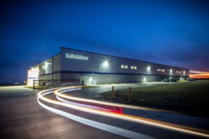 Reiloy Warehouse nighttime photo