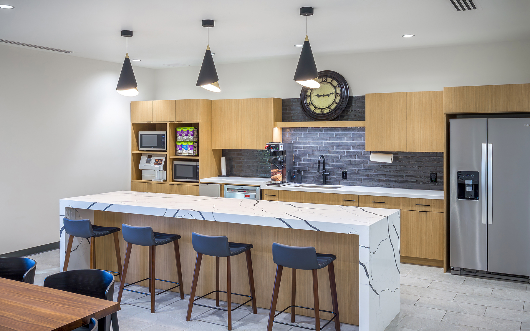 WSU Woodman Alumni Center lounge and kitchen area.